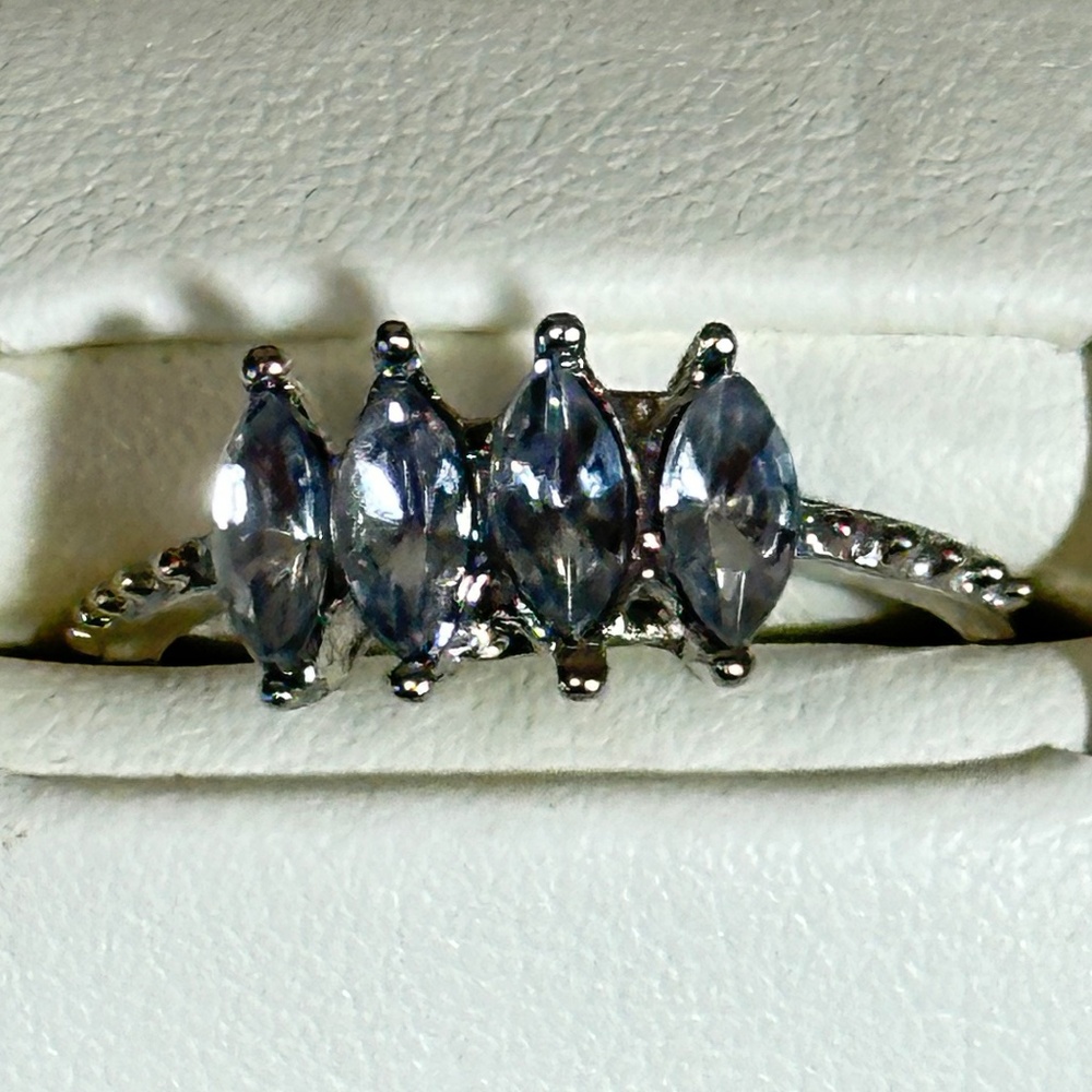 Silver tone ring w/4 marquee lab created or synthetic diamonds